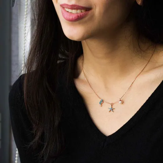 Nano Turquoise Seahorse With Starfish Silver Pendant Nano Turquoise Seahorse With Starfish Silver Pendant